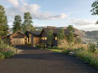 Experience modern mountain living in this stunning architectural home, featuring a sleek dark exterior with stone accents and a metal roof.