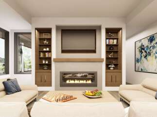 This modern living room features a stunning fireplace with a mounted television above, flanked by built-in bookshelves.