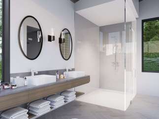 Experience modern luxury in this stunning bathroom featuring a spacious walk-in shower with sleek glass enclosure and elegant tile work.