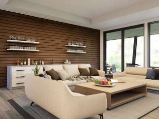 Experience modern living in this stunning open-concept living space, featuring a sleek wet bar with ample storage and display shelves.