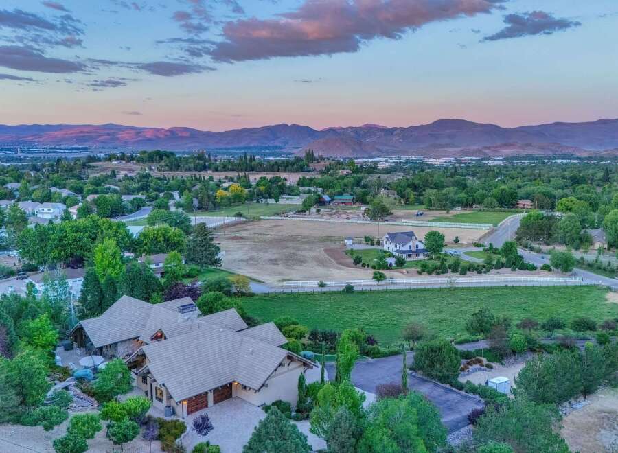 Discover this stunning estate nestled amidst rolling hills and picturesque mountain views.