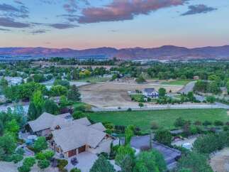 Discover this stunning estate nestled amidst rolling hills and picturesque mountain views.
