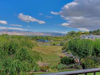 Discover this stunning property offering breathtaking mountain views and serene natural beauty.