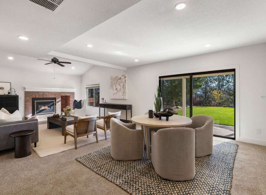 Experience seamless indoor-outdoor living in this beautifully appointed living and dining area.