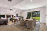 Experience seamless indoor-outdoor living in this beautifully appointed living and dining area.