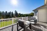 Enjoy breathtaking views from this spacious deck, perfect for outdoor entertaining or quiet relaxation.