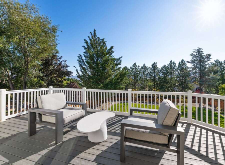 Enjoy breathtaking views from this expansive deck, perfect for outdoor entertaining or quiet relaxation.