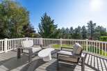 Enjoy breathtaking views from this expansive deck, perfect for outdoor entertaining or quiet relaxation.