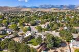 Discover this charming suburban neighborhood nestled against a backdrop of majestic mountains.