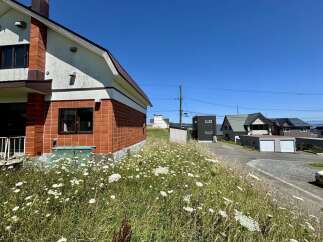 Discover this charming property featuring a unique brick exterior and a spacious, sunlit interior.