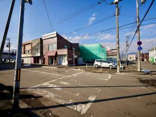 Discover this prime commercial property located at a busy intersection, offering excellent visibility and accessibility.