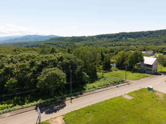Discover this charming property nestled amidst lush greenery and rolling hills, offering a serene escape.