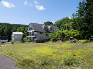 Discover this charming property nestled amidst lush greenery and rolling hills.