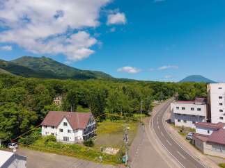 Discover this charming property nestled amidst lush greenery, offering a serene escape with stunning mountain views.
