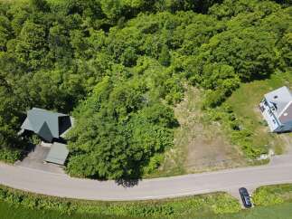 Discover this unique property nestled amidst lush greenery, offering a serene escape.