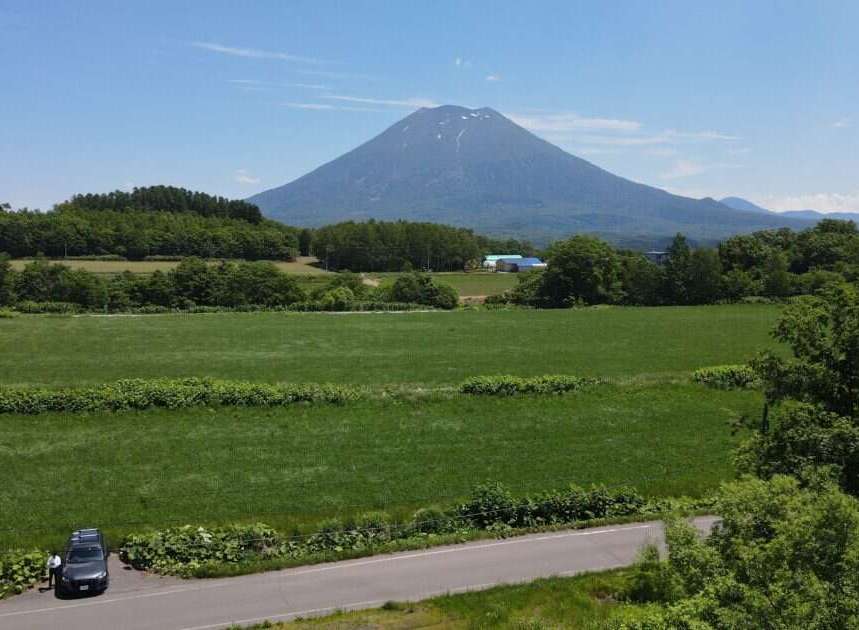 Discover breathtaking natural beauty with this stunning property offering panoramic views of a majestic mountain.