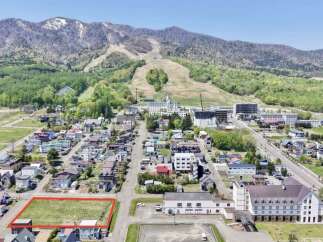 Discover this prime parcel of land, highlighted with a red border, offering a fantastic opportunity in a scenic mountain town.