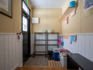 This entryway features a practical and organized space, perfect for managing outdoor gear.