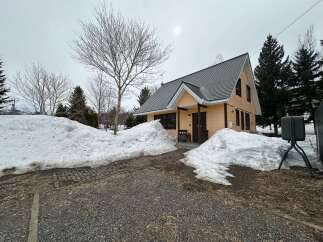 Experience the charm of this cozy home, perfect for a winter retreat.