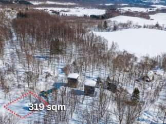 Discover this unique 319 sqm plot of land, nestled amidst a serene winter landscape.