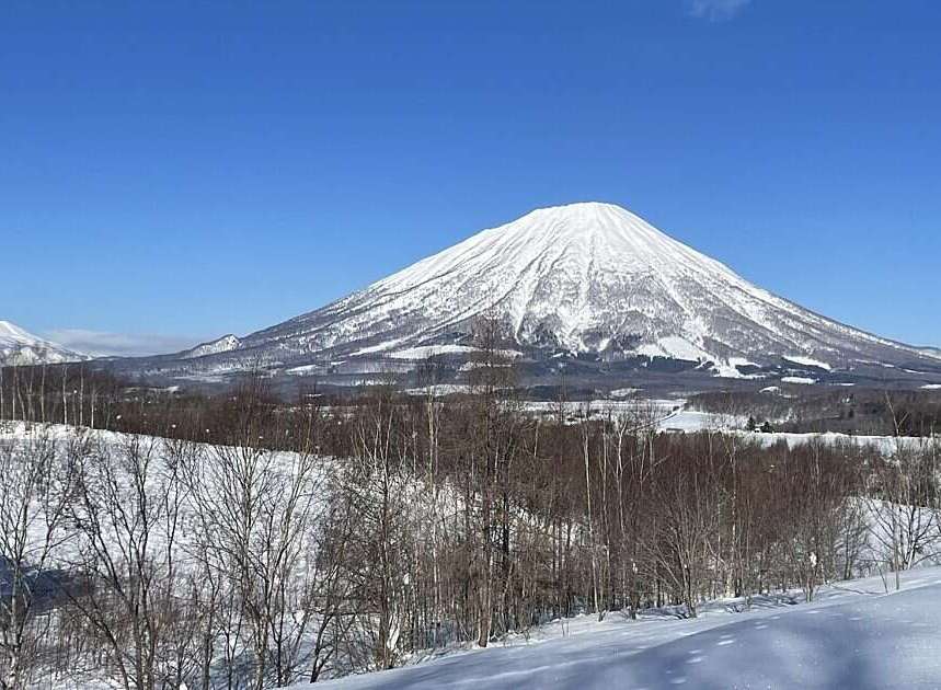 Experience breathtaking mountain views from this stunning property, perfect for those seeking a serene winter escape.