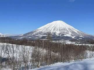Experience breathtaking mountain views from this stunning property, perfect for those seeking a serene winter escape.