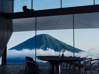 Experience breathtaking panoramic views of Mount Fuji from this luxurious modern dining room.