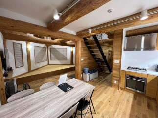 Experience rustic charm and modern convenience in this unique log cabin-style home.