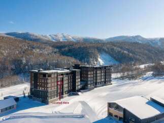 Experience luxury mountain living in this stunning property, perfectly situated amidst breathtaking snowy landscapes and ski slopes.
