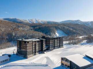 Experience luxury mountain living in this stunning property, perfectly situated amidst breathtaking snowy landscapes and ski slopes.