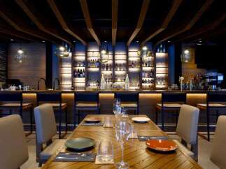 Experience sophisticated dining and vibrant nightlife in this upscale bar and restaurant.