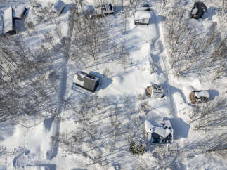 Discover this unique property nestled in a serene, snow-covered landscape, offering a tranquil escape.