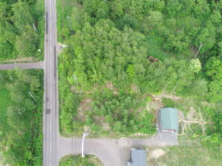 Discover this charming property nestled amidst lush greenery, offering a serene escape.