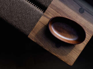 Experience rustic elegance with this beautifully crafted wooden bowl, perfect for adding a touch of natural warmth to any space.