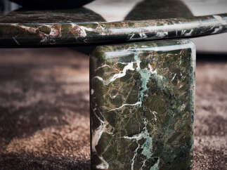 Experience luxury with this stunning marble coffee table, featuring a unique, organic design that adds a touch of natural elegance to any living space.