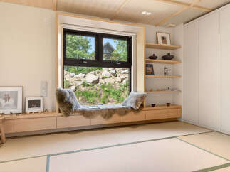 Experience serene living with this beautifully designed room featuring a cozy window seat adorned with plush faux fur, perfect for enjoying the natural light and scenic views.