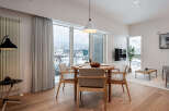 Experience modern living in this beautifully appointed dining and living area.