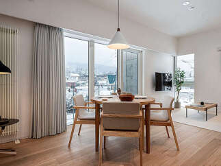 Experience modern living in this beautifully appointed dining and living area.