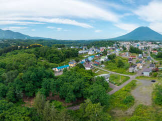 Discover this charming property nestled amidst lush greenery, offering a serene escape with breathtaking mountain views.