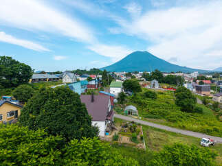 Discover this charming property nestled in a picturesque village with a majestic mountain backdrop.
