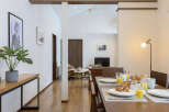 Experience modern living in this beautifully appointed dining and living area.