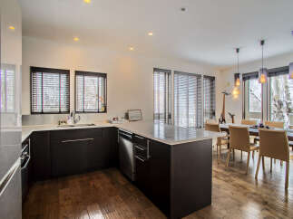 Experience modern living in this stunning open-concept kitchen and dining area, perfect for entertaining.