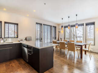 Experience modern living in this open-concept kitchen and dining area, perfect for entertaining.
