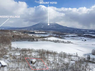 Discover your dream winter escape with this charming property nestled amidst a serene snowy landscape.