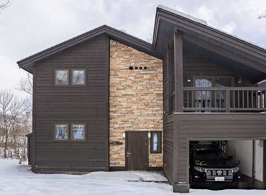 Experience luxury mountain living in this stunning modern chalet, perfect for a winter getaway.