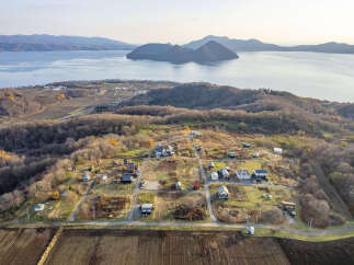 Discover this charming rural retreat nestled amidst rolling hills and overlooking a serene lake.