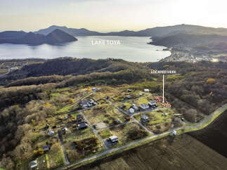 Discover this charming rural property nestled amidst rolling hills and overlooking a serene lake.