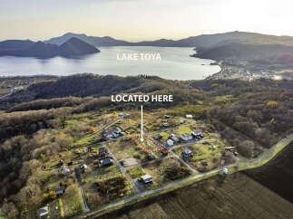 Discover this charming rural property nestled amidst rolling hills and overlooking a serene lake.