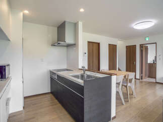Experience modern living in this beautifully appointed kitchen and dining area.