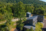 Discover modern living nestled amidst lush greenery.